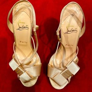 Cristian Louboutin in cream satin never worn 6” heels stunning
